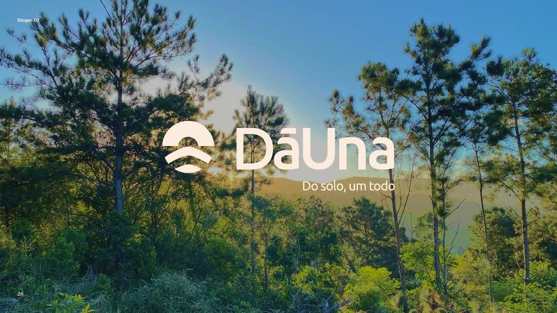 Prancha do slogan “Do solo, um todo”, em bege sobre verde